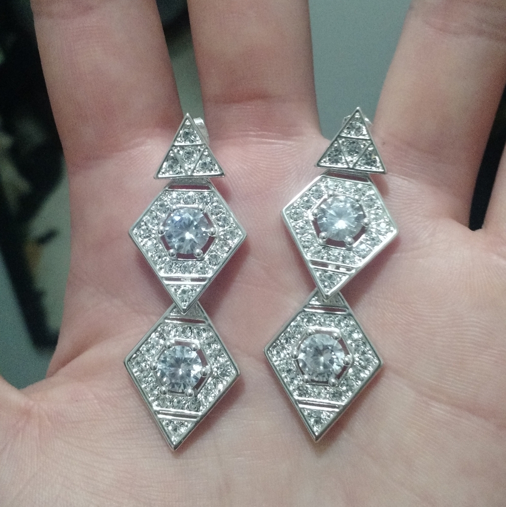 Luv aj silver tone crystal earrings
